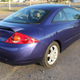 Illustration for article titled For $5,000, Is This Low-Mileage 1999 Mercury Cougar V6 The Cat’s Meow?